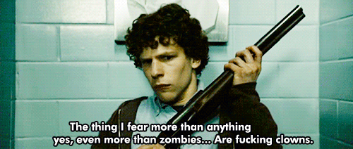 Clown crawling under a bathroom stalll